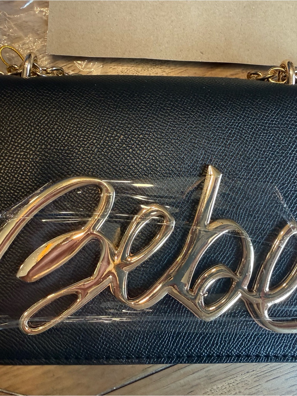 bebe Black Crossbody Bag with Gold Script Logo
